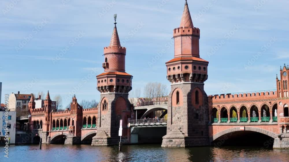 Hyperlapse (motion time lapse) of the Oberbaum Bridge, or Oberbaumbrucke, across the river Spree in Berlin, Germany. It links Friedrichshain and Kreuzberg. Timelapse.
Hyperlapse (motion time lapse) of the Oberbaum Bridge, or Oberbaumbrucke, across the river Spree in Berlin, Germany. It links Friedrichshain and Kreuzberg. Timelapse.