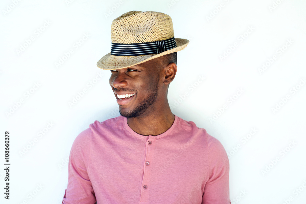 Close up smiling young black man with hat Close up smiling young black man with hat