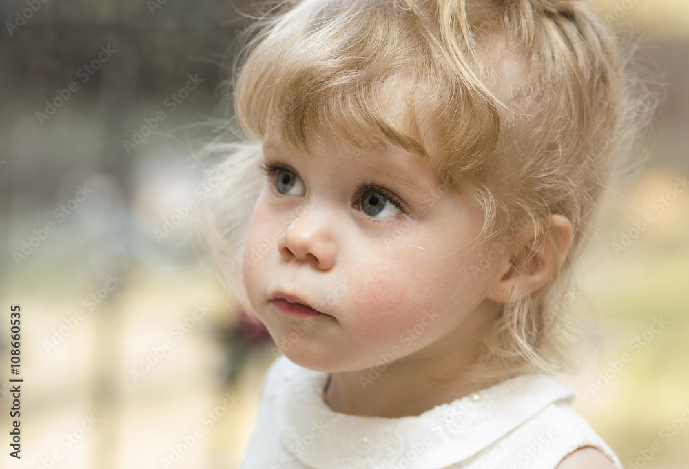 Little girl of 2 year old looking up. Little girl of 2 year old looking up.