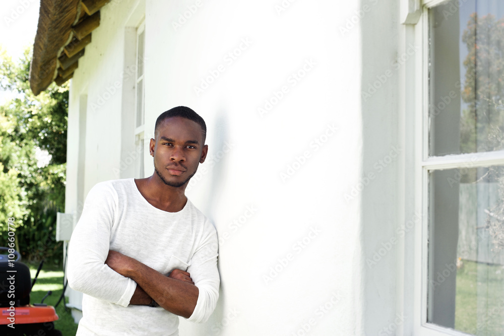 Handsome young african man with his arms crossed Handsome young african man with his arms crossed