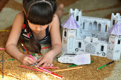 girl builds a house