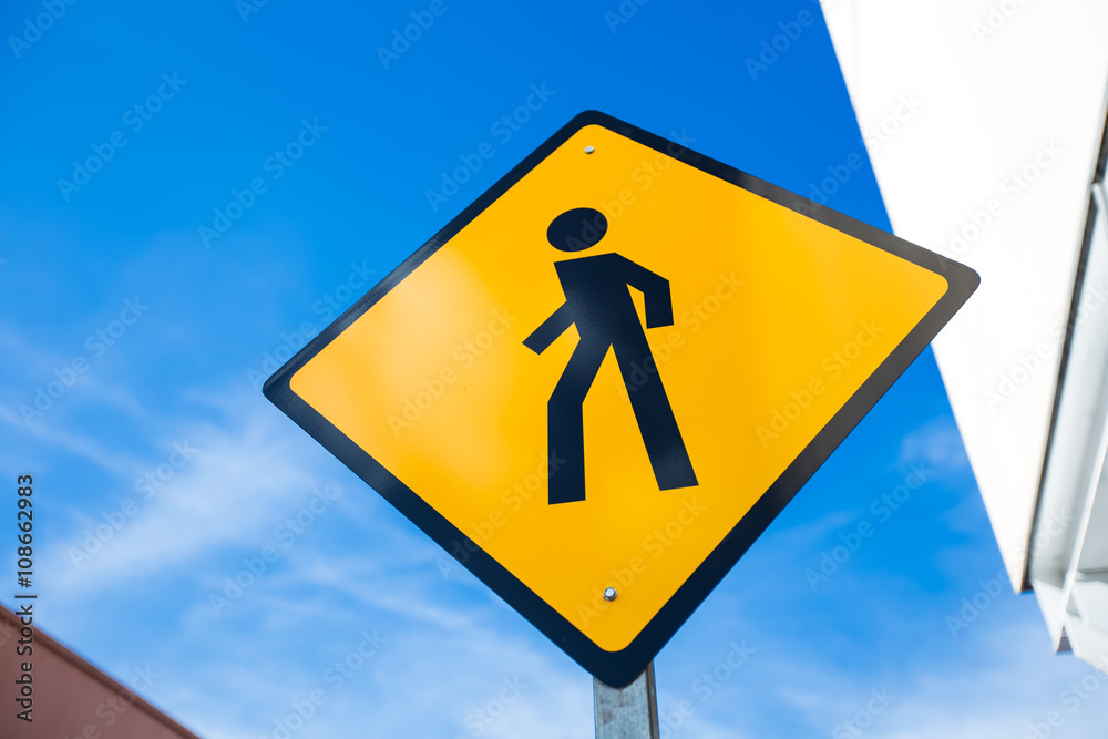 Pedestrian crossing street sign at the street Pedestrian crossing street sign at the street