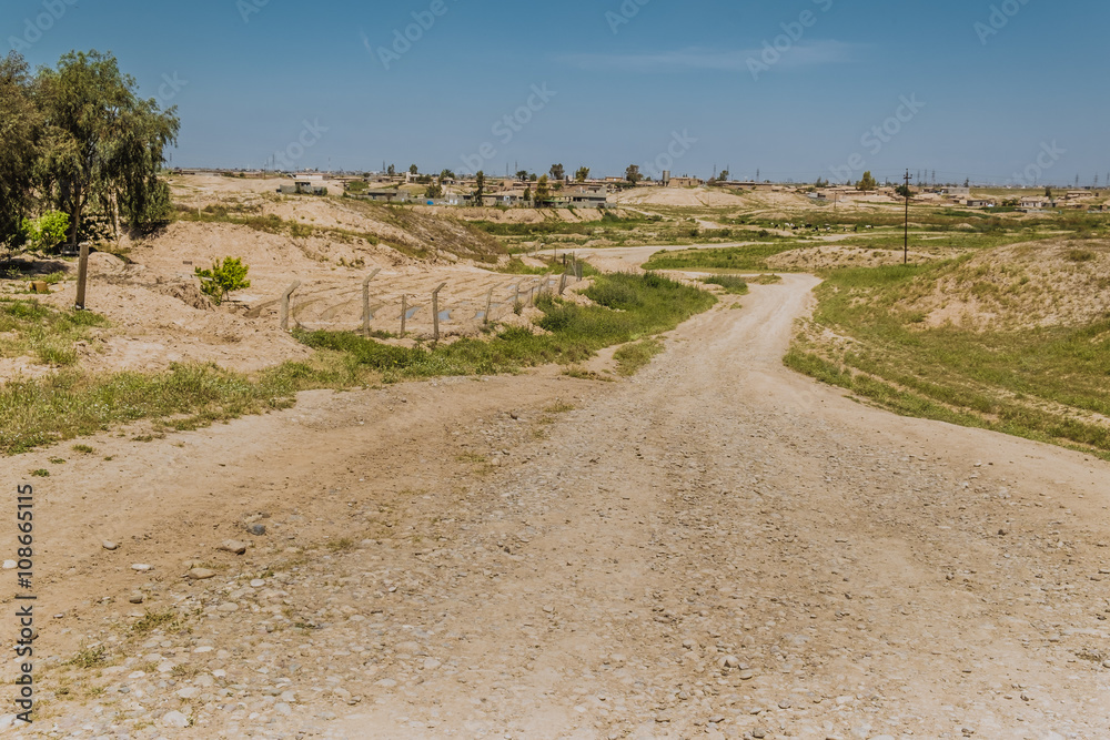 Unpaved road in Iraqi desert in Summer season