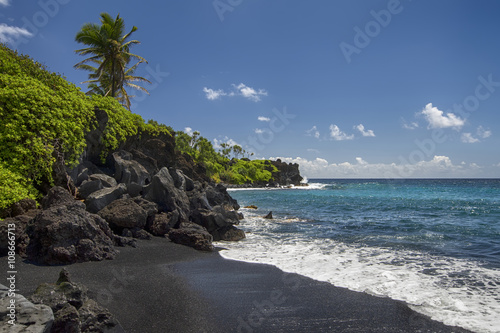 Waianapanapa state park, black sand beach. Maui, Hawaii photo