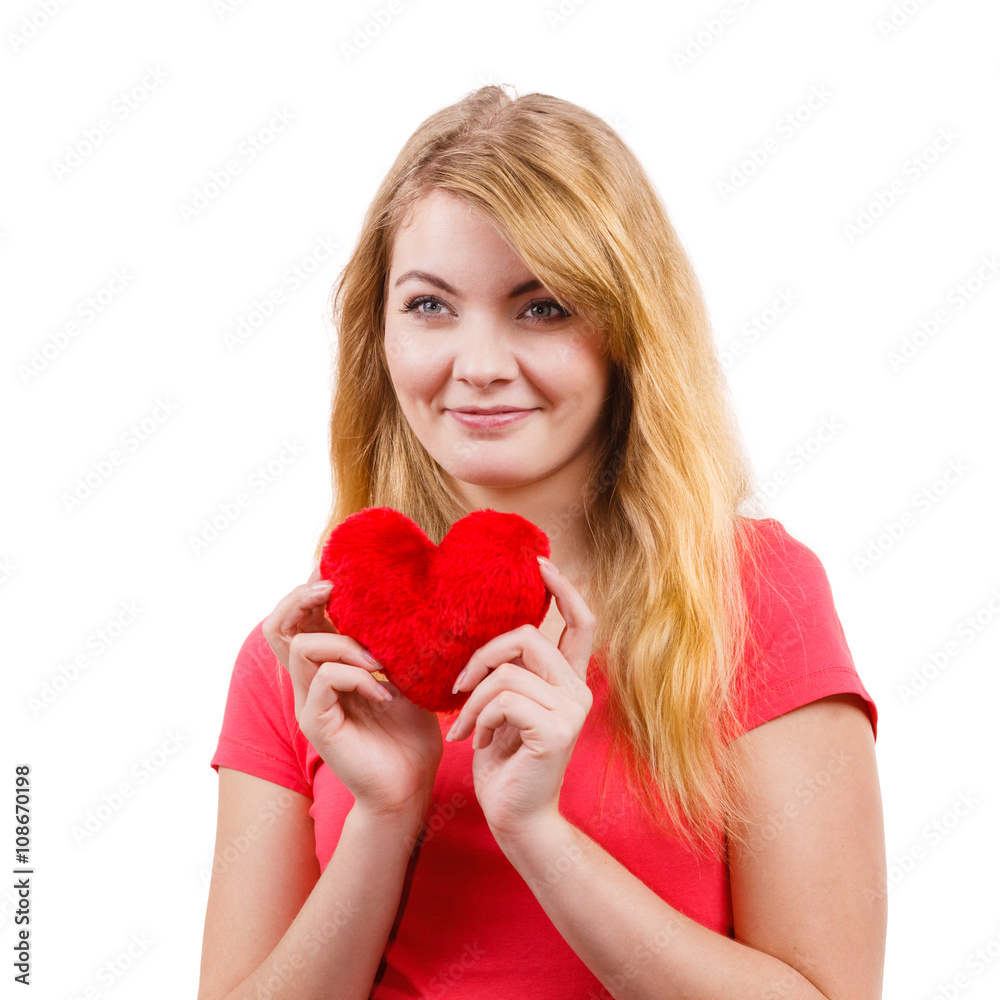 Woman blonde girl holding red heart love symbol Woman blonde girl holding red heart love symbol