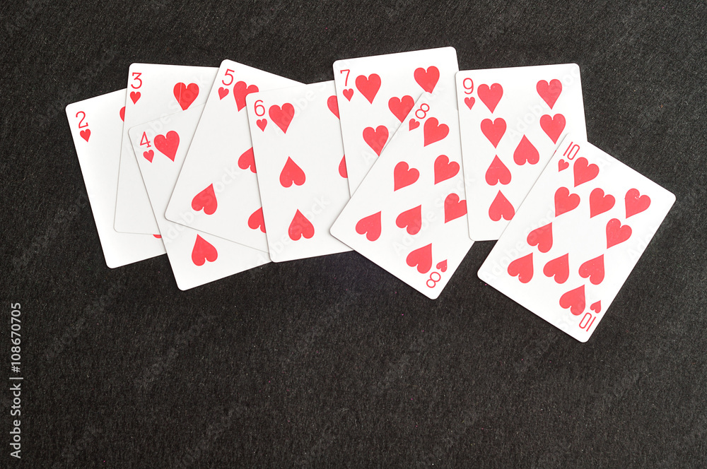 Playing card. Two to ten of hearts isolated on a black background Playing card. Two to ten of hearts isolated on a black background