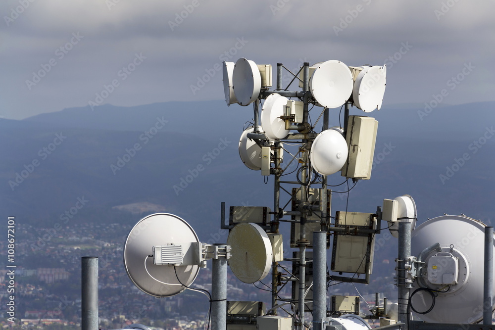Bunch of transmitters and aerials on the telecommunication tower Bunch of transmitters and aerials on the telecommunication tower
