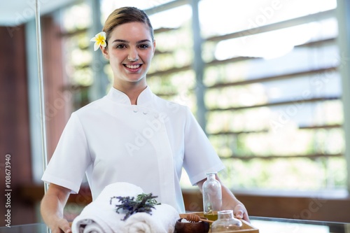 Portrait of smiling masseuse
