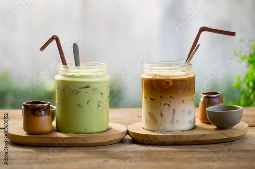 ice latte coffee and matcha green tea on wood table