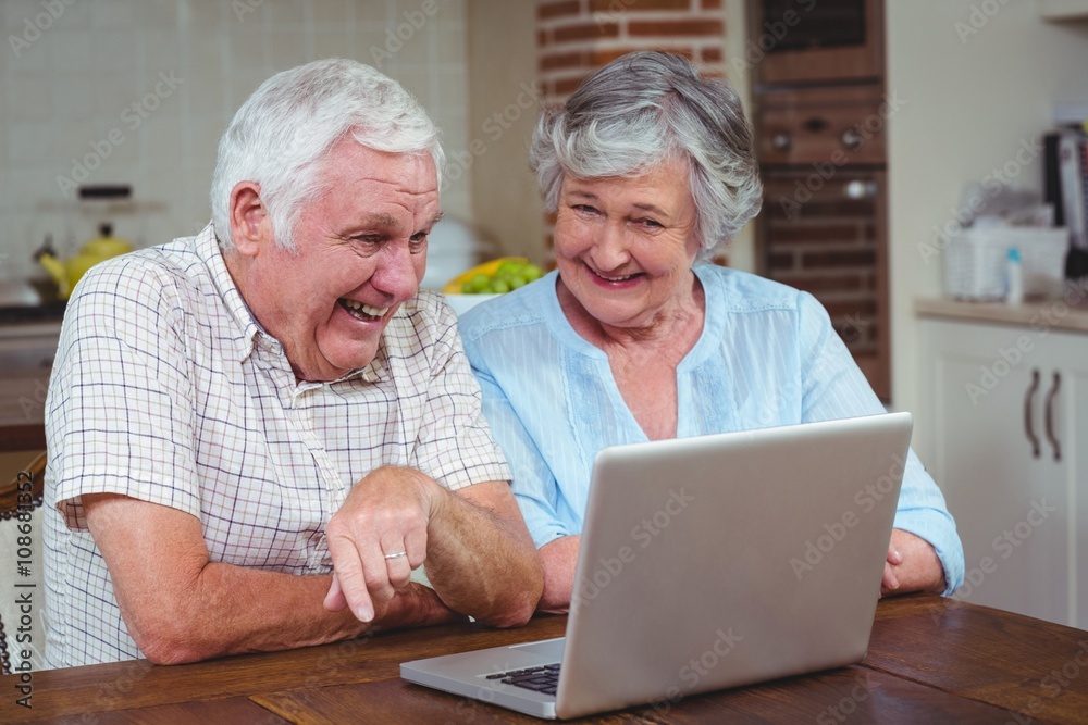 Retired couple using laptop Retired couple using laptop