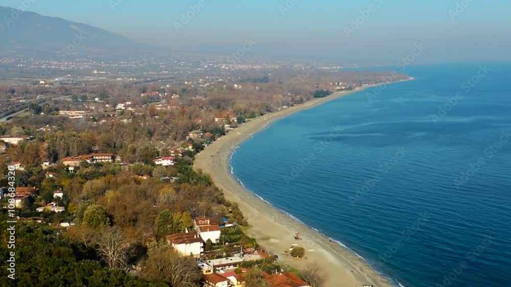 Pan left extreme long shot from turqoise blue sea and golden beaches to snow capped Mount Olumpus
Pan left extreme long shot from turqoise blue sea and golden beaches to snow capped Mount Olumpus