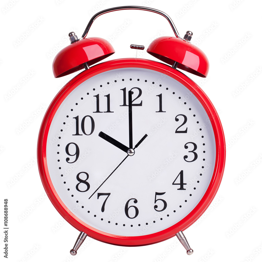Red alarm clock shows exactly ten Red alarm clock shows exactly ten