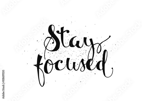 Stay focused inscription. Greeting card with calligraphy. Hand drawn design. Black and white.
