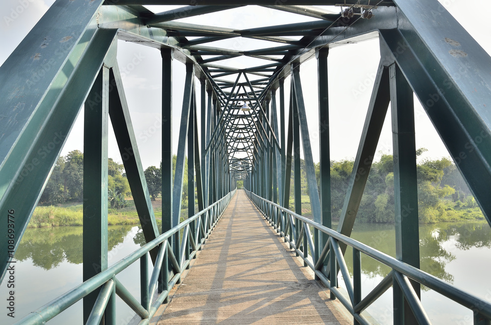The old iron bridge in midday (Select focus)
