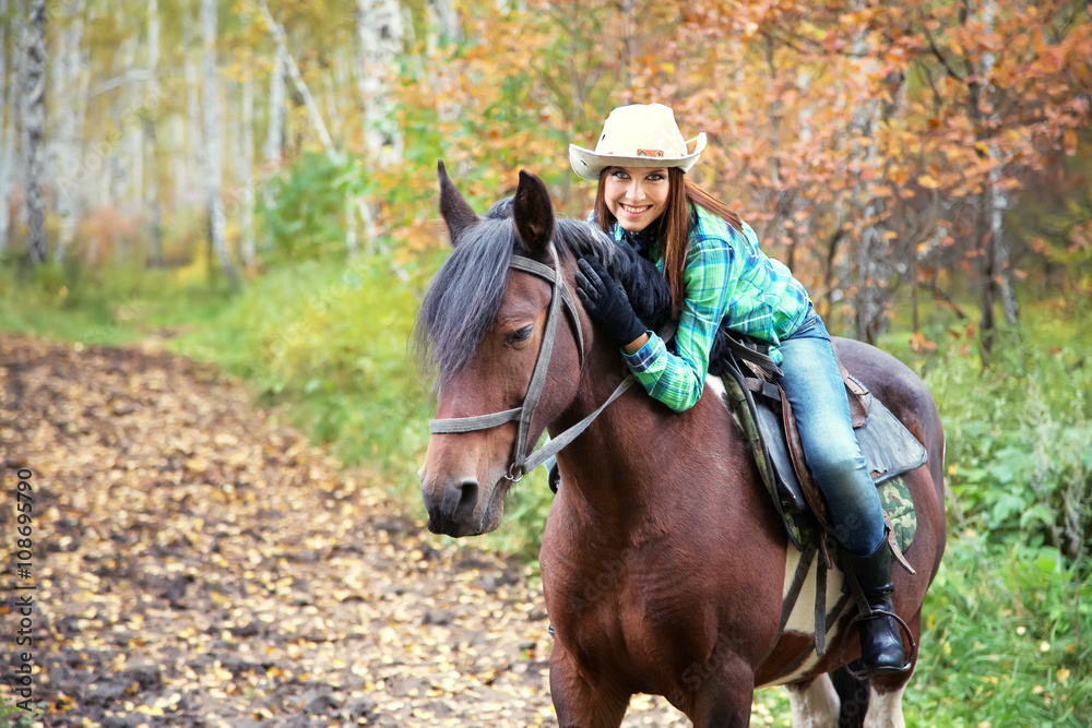 woman riding a horse