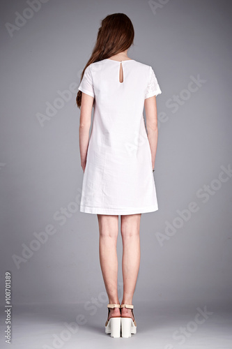 Catalog of fashion clothes for business woman mom casual office style meeting walk party silk cotton dress summer collection accessory shoes beautiful model long brunette hair natural make up  back