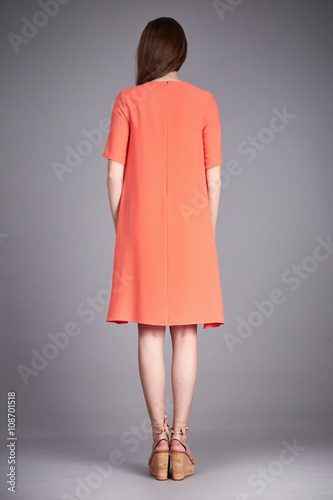 Catalog of fashion clothes for business woman mom casual office style meeting walk party silk cotton dress summer collection accessory shoes beautiful model long brunette hair natural make up  back