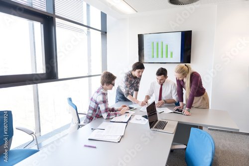 young business people group on meeting at modern office
