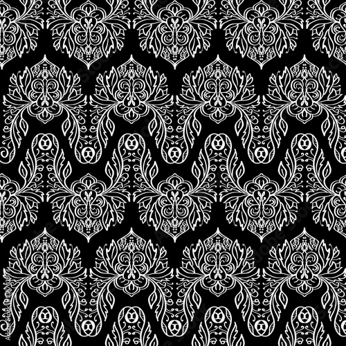 Vector seamless texture. Black and white floral pattern for design and fashion. Flowers and leaves motifs
