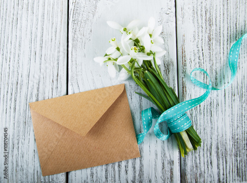 bouquet of snowdrops with envelope
