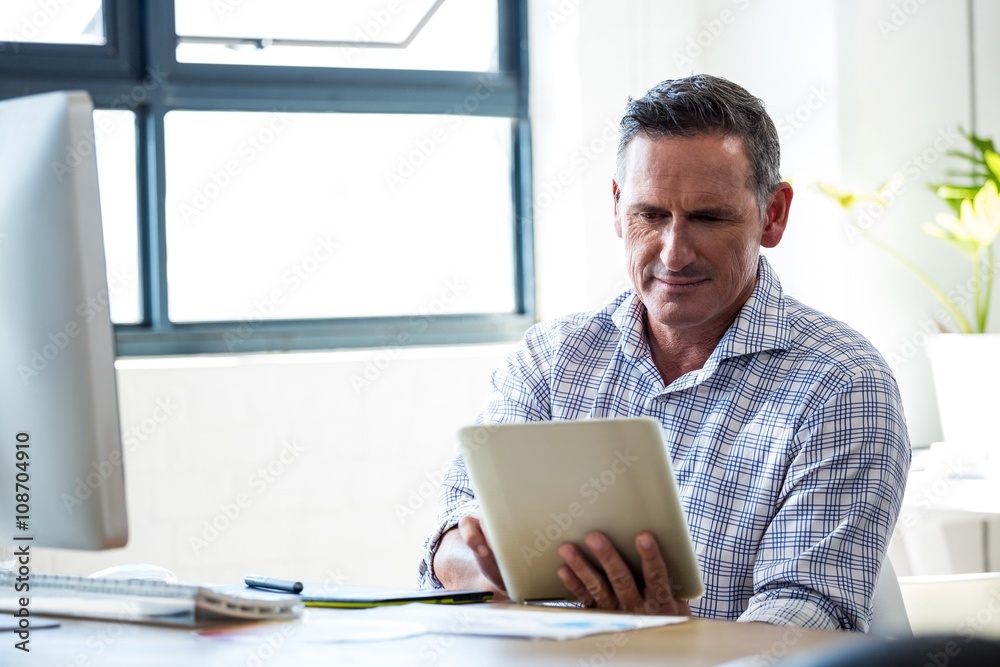 Happy man using digital tablet Happy man using digital tablet