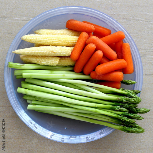 Vegetables (Asparagus, Baby Carrots, Baby Sweet Corns) Cut and Sliced Ready to be Used as Ingredient of Recipe