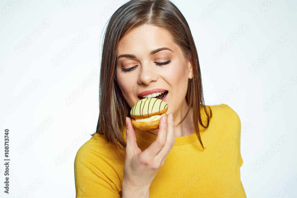 Close up face portrait of happy woman eatin macaron French cake Close up face portrait of happy woman eatin macaron French cake