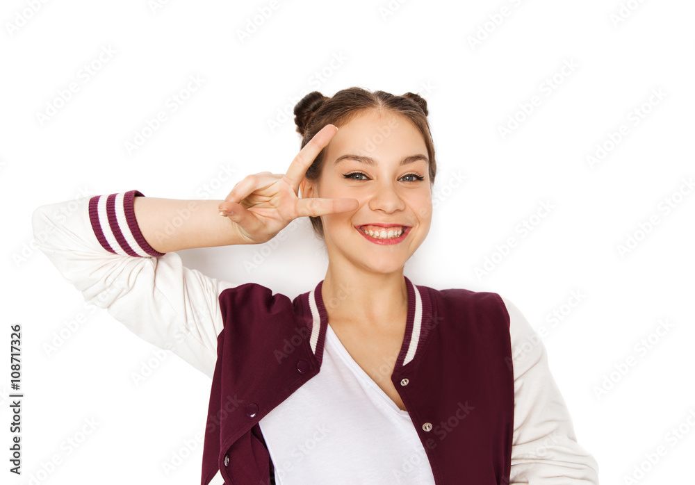 happy smiling teenage girl showing peace sign happy smiling teenage girl showing peace sign