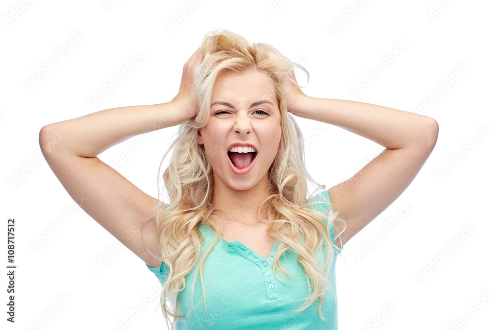 smiling young woman holding to her head or hair smiling young woman holding to her head or hair