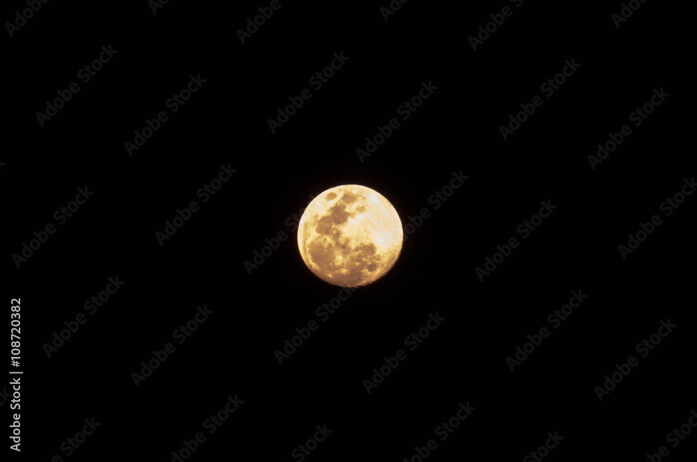 Full moon over dark black sky Full moon over dark black sky