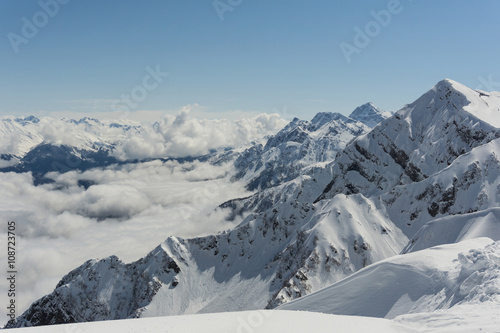 Winter mountain landscape and cloudy sky. © Vasily Merkushev