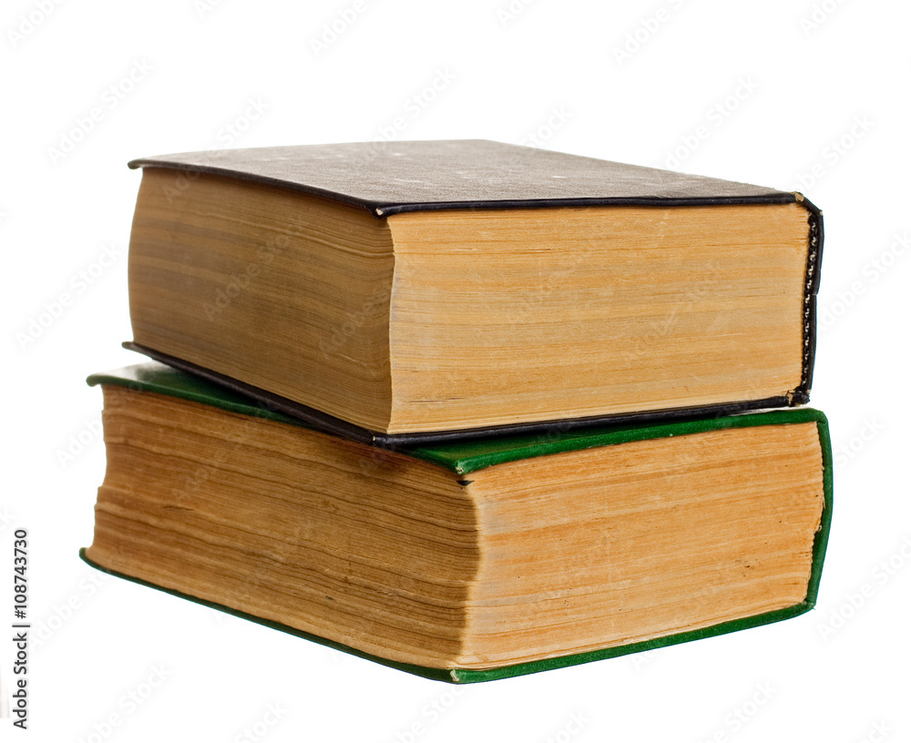 Two old books isolated on the white background Two old books isolated on the white background