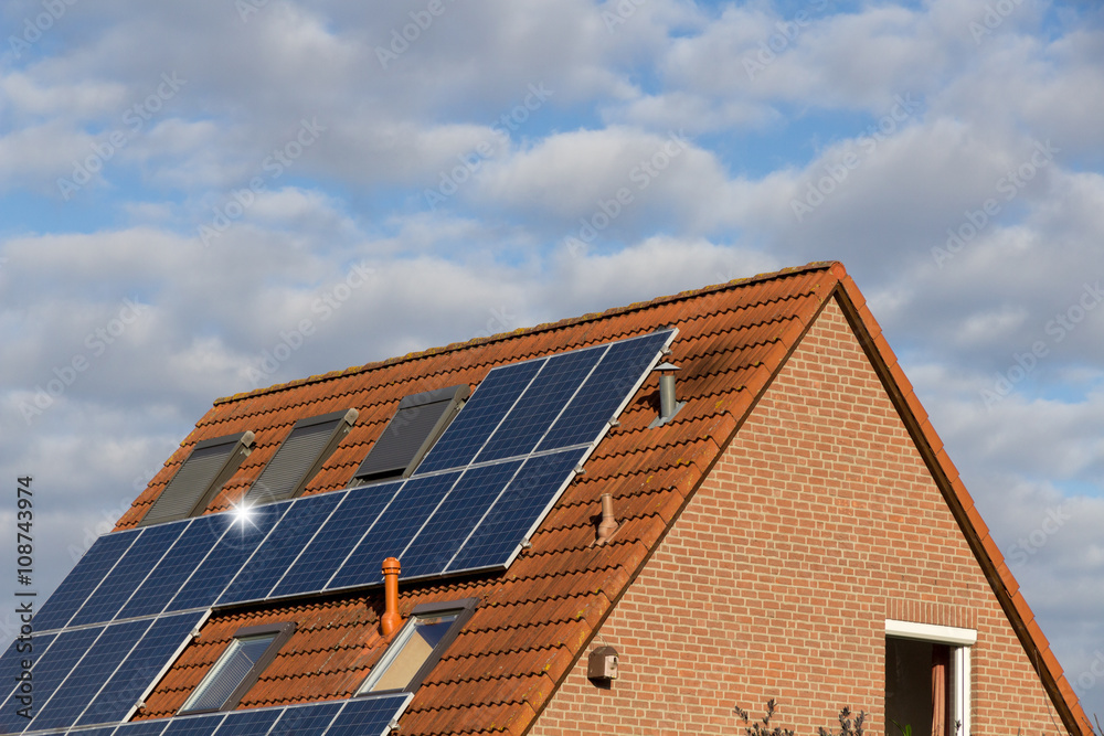 house with solar energy and panels on the roof house with solar energy and panels on the roof