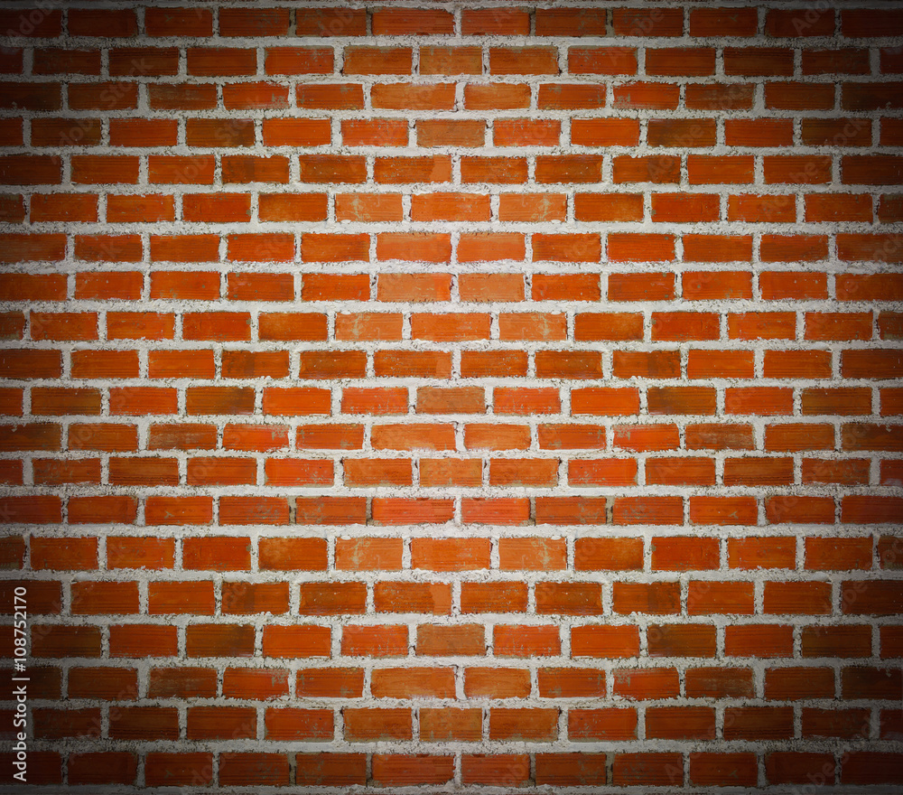 Obraz premium Ciemny odcień tła ściany z cegły.