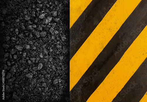 Close-up asphalt at the road under construction. © thawornnurak