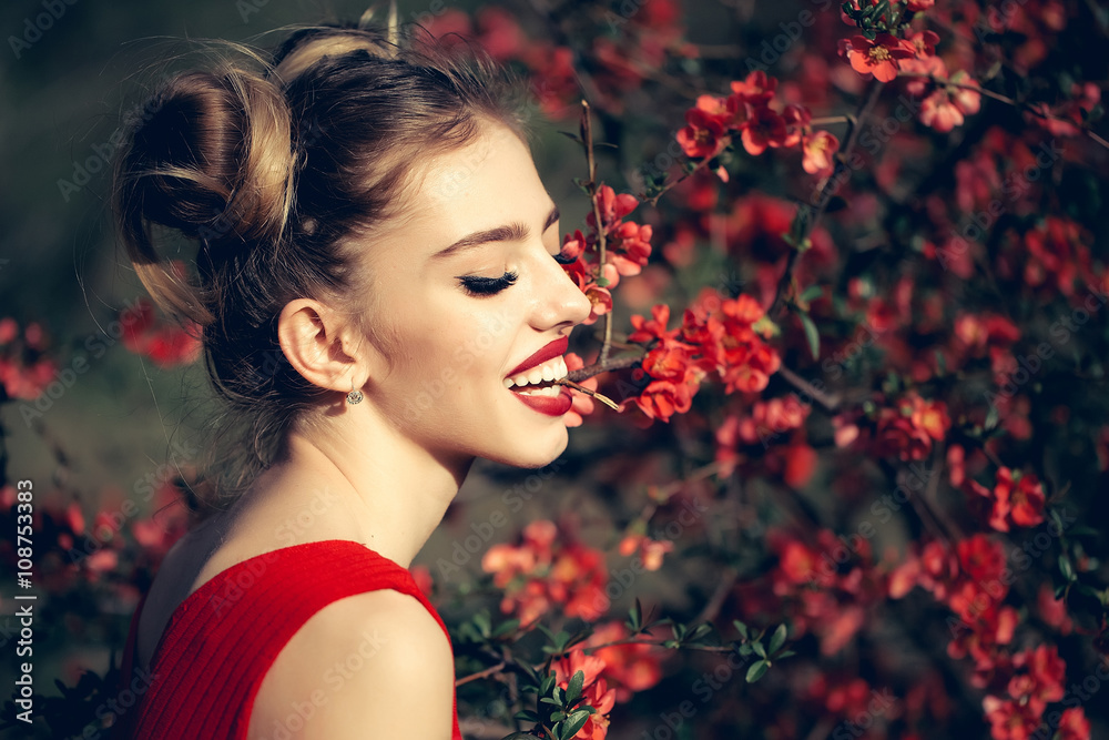 Naklejka premium Woman with red blossom
