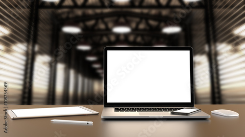 Laptop, tablet, smartphone, mouse,and pencil on the background of the hall. Template, mockup.