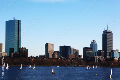 Boston, Massachusetts city center with sailboats in foreground