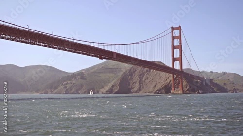 Slow motion shot of Golden Gate bridge taken from boat ride.
