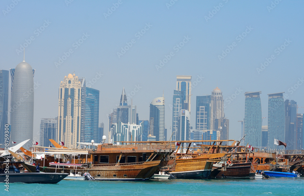 Dhows in front of the skyscrapers of New Doha, Qatar