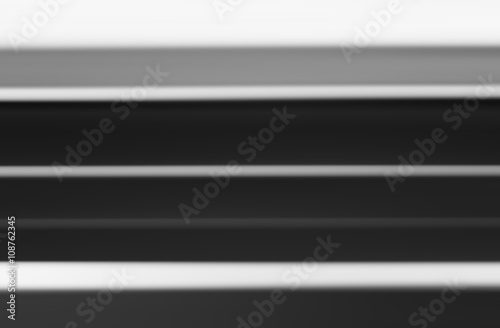 Horizontal black and white blurred abstraction lines background