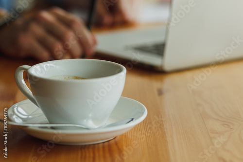 Freelancer working in coffee shop. Stock image