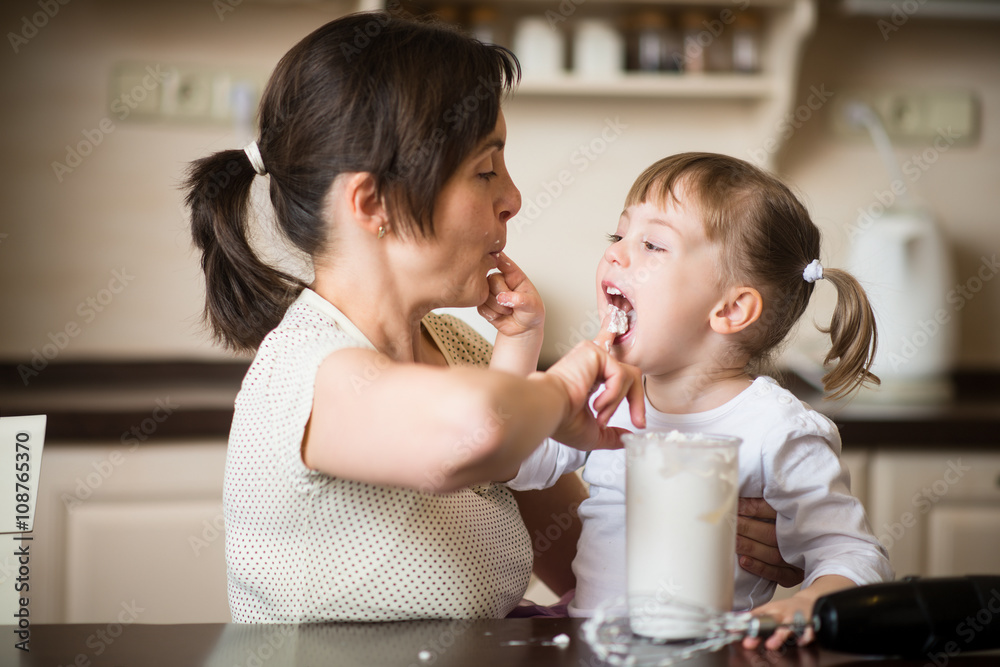 Mother with daughter - it iastes best this way Mother with daughter - it iastes best this way