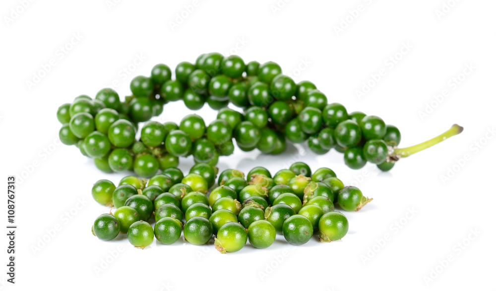 Green peppercorns isolated on the white
