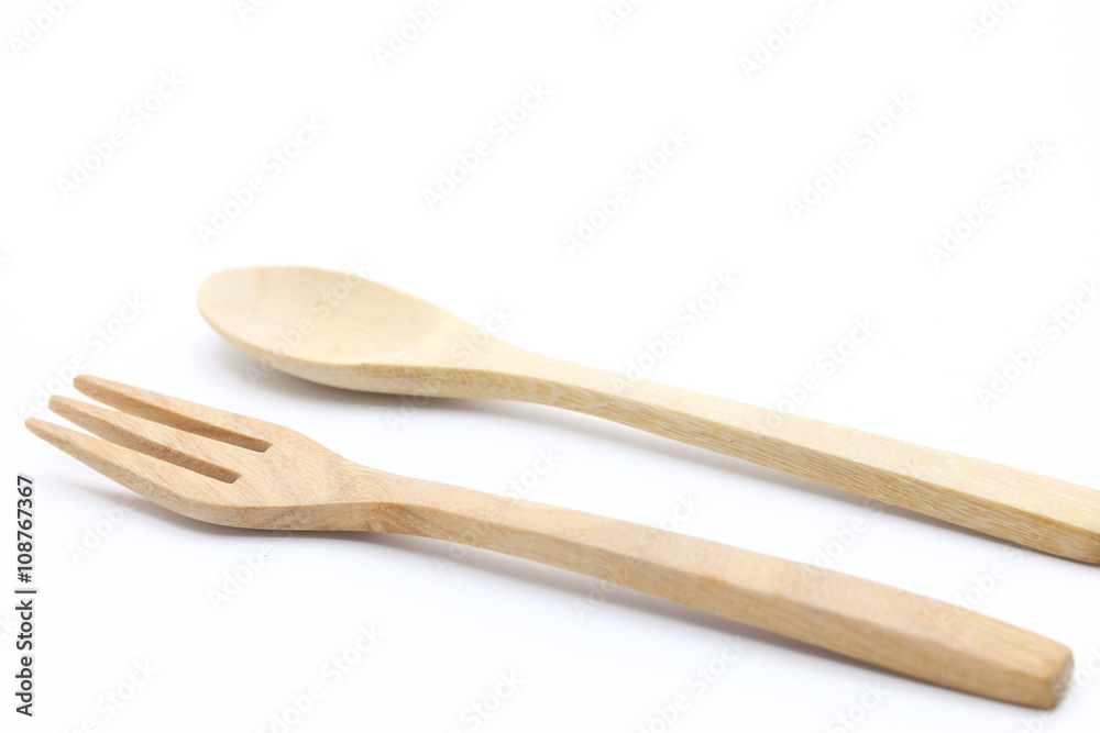 Wooden Spoon and Fork Isolated on white Background Wooden Spoon and Fork Isolated on white Background