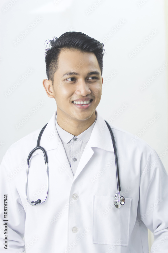 Friendly male doctor at his office