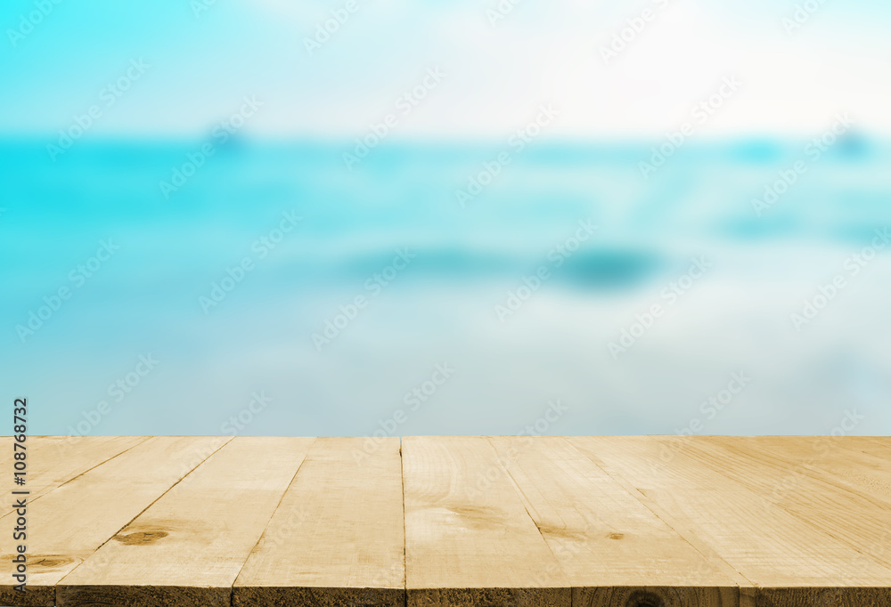 image of wooden table in front of Summer sea in Thailand image of wooden table in front of Summer sea in Thailand