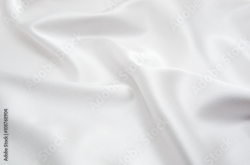 biała satynowa tkanina jako tło