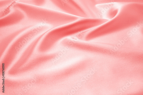 red satin fabric as background