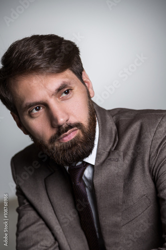 Bearded man in suit portrait © ImageFlow